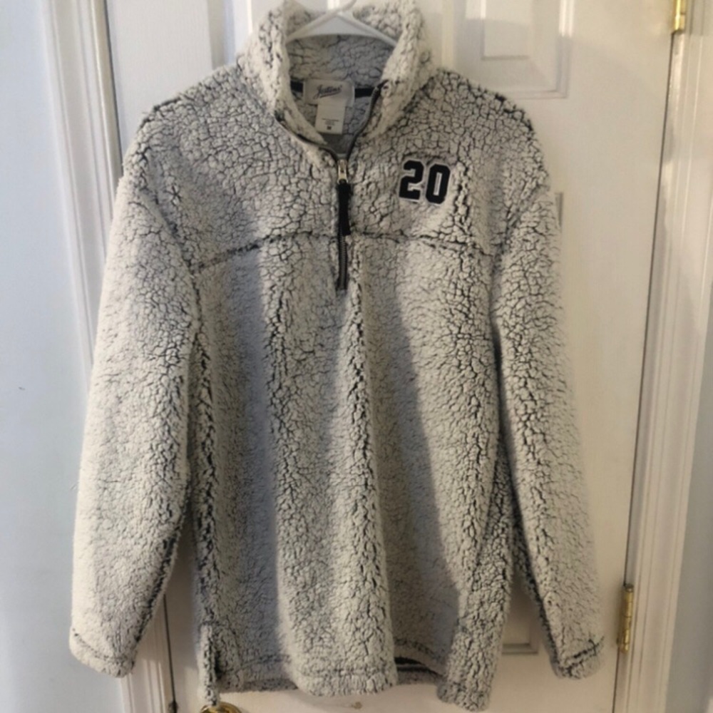 Unisex size Medium pullover sweater from Jostens with embroidered “20” on front